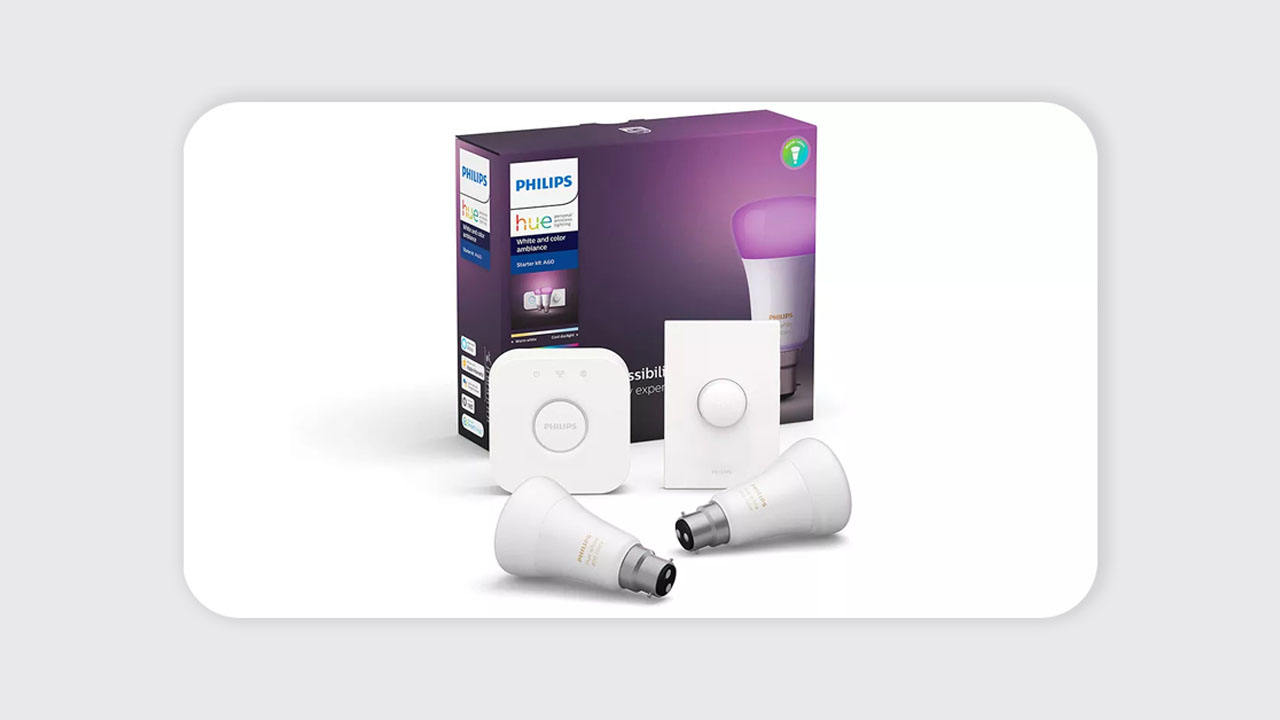 Philips Hue lighting system in a living room, creating a vibrant ambiance with customizable colors controlled via app.