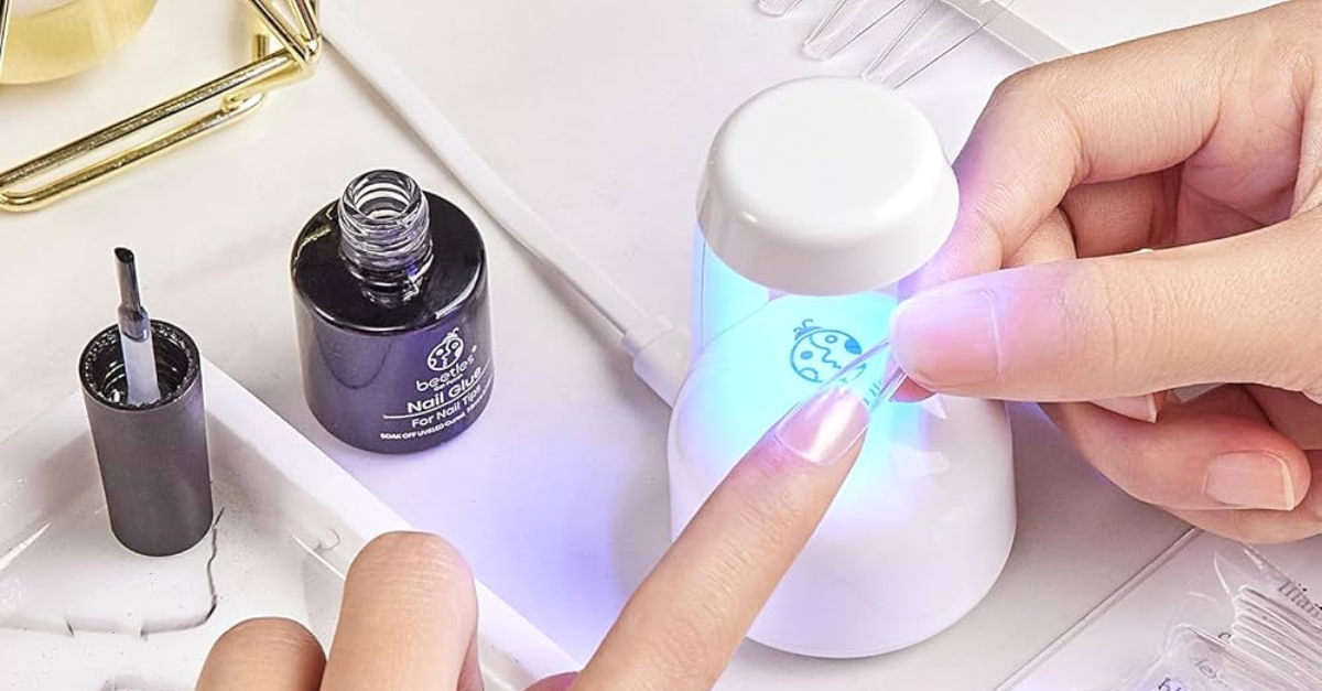 Mini UV light curing gel nails at home.