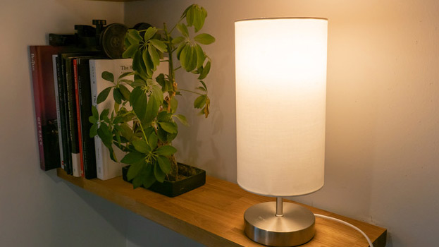 Modern smart lamps including LIFX Luna, Philips Hue Go, and Govee JBL illuminating a cozy home.Best Smart Lamp 2025.