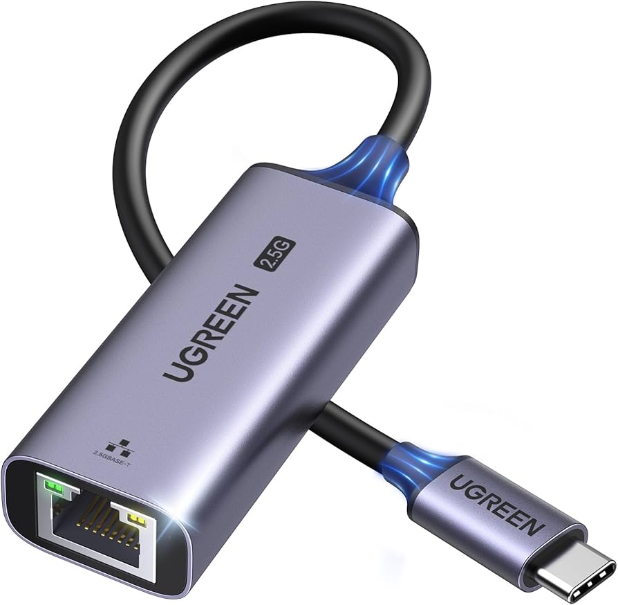 The sleek UGREEN USB C to Ethernet adapter plugged into a modern laptop.