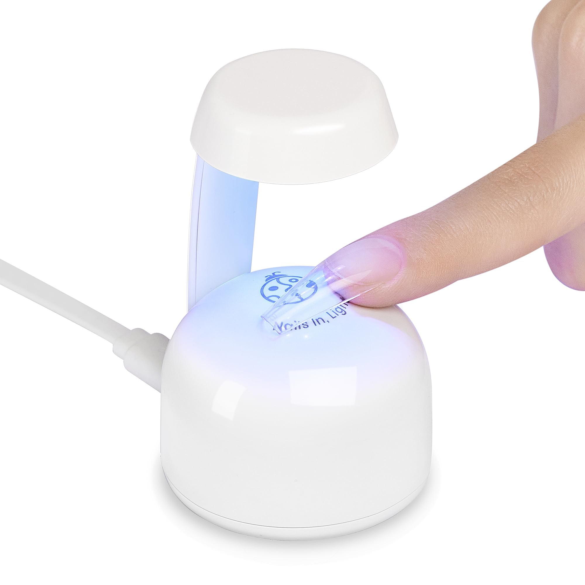 Beetles Mini UV Light for Gel Nails with Smart Sensor in use for an at-home manicure.