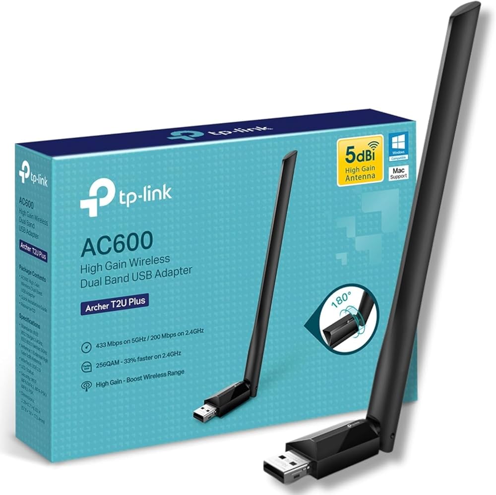 The TP-Link Archer T2U Plus nano USB WiFi adapter plugged into a desktop computer.
