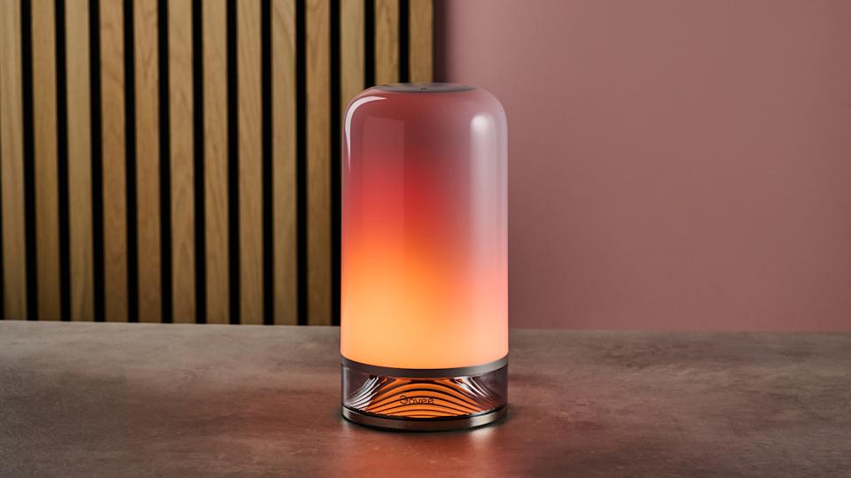 Govee RGBIC Smart Table Lamp 2 illuminated on a bedside table.