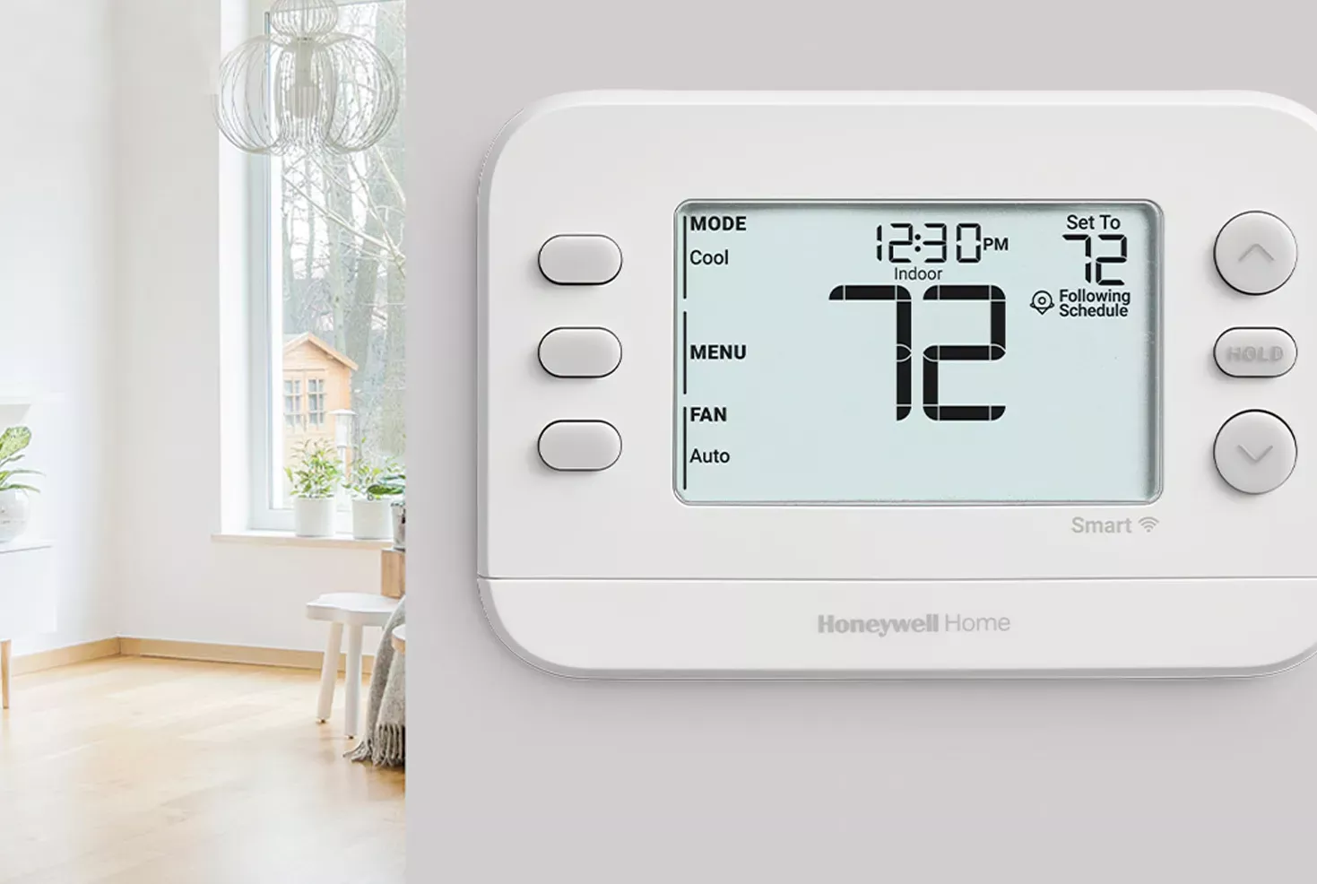Honeywell Home RTH6360D1002 Programmable Thermostat on a wall.